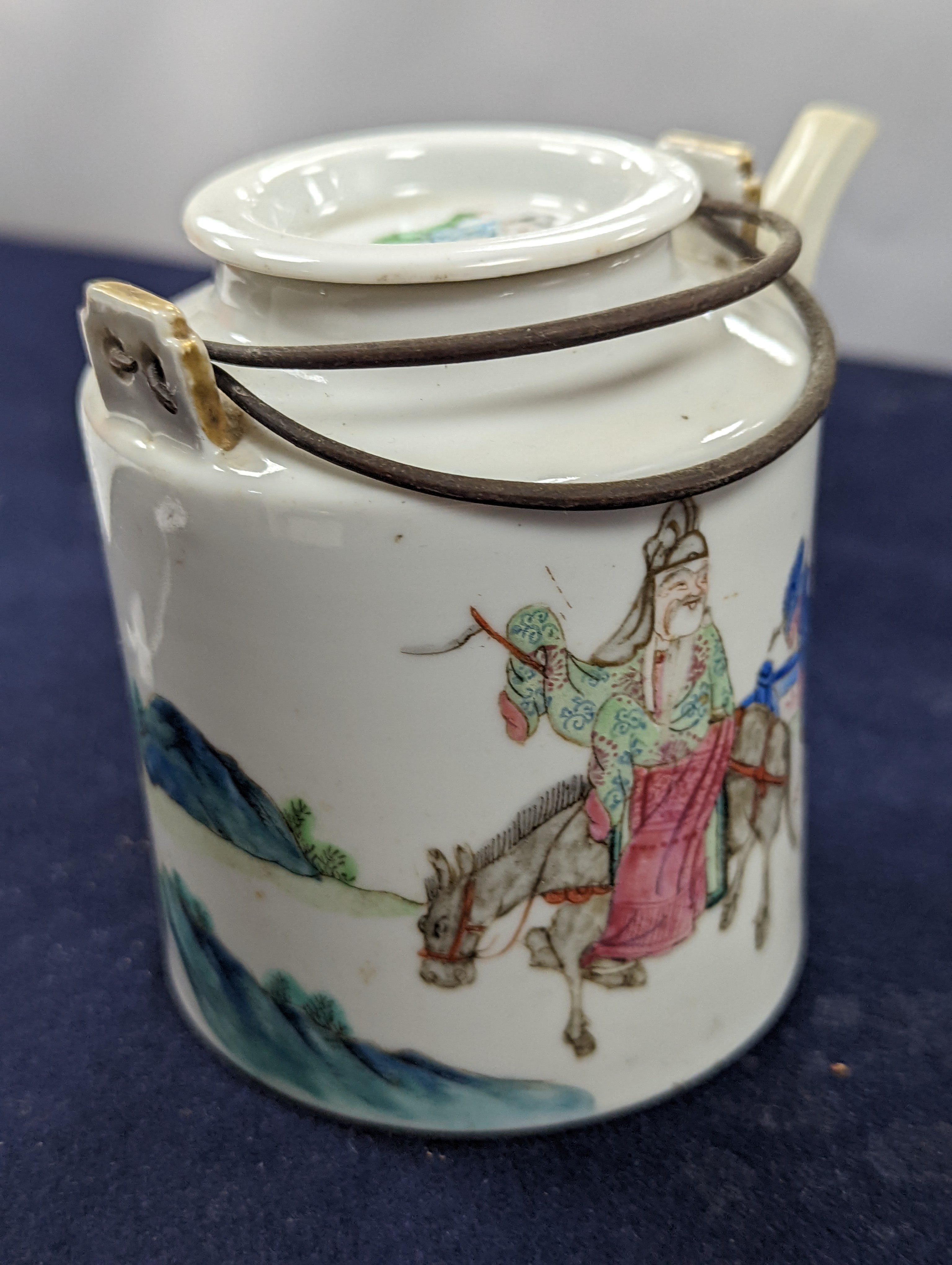 A Chinese famille rose cylindrical teapot and cover, 19th century 11cm, wood stand